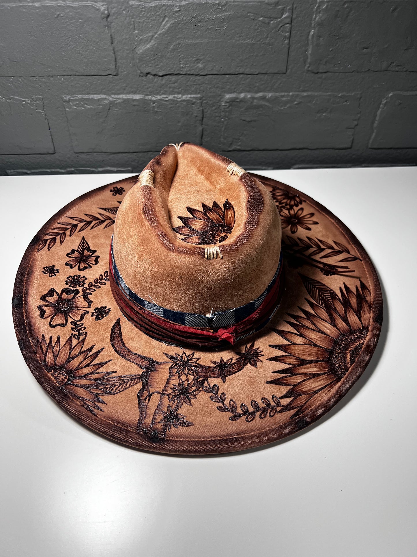 Hand-burned cowboy hat